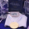 Chocolate Gold Medal as Corporate Dinner Table setting