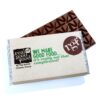 A partially unwrapped Giant Branded Chocolate Bar with triangular segments sits beside its wrapper, labeled "real good food" and "We make good food... it's really not that complicated!.