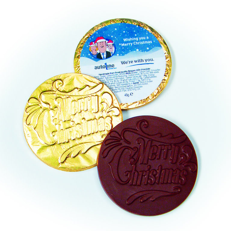 Three round chocolate coins embossed with "Merry Christmas." One wrapper displays a holiday message and cartoon illustration.