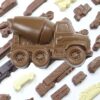 Featuring a large "Chocolate Cement Mixer" in the center, this assortment includes vehicle-shaped chocolates like cars and trucks.