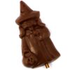 happy_witch_lollipop Happy Witch Lollipop featuring a chocolate witch figure with a pointed hat and pumpkin-shaped bag, standing upright.