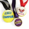 img_0597_-_m2_0724.2 Three Branded Chocolate Medals with ribbons feature designs: "HS YES Champion" in yellow, "ValorFest 2024 #TeamValor" with confetti, and "Aspers Casino Millionaire Maker" in purple.
