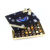 img_4357_-_m21024 An open box of customized Christmas chocolates featuring "Priavo" with a ribbon and snowflake designs.
