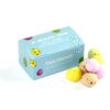 A light blue Mini Egg Favour Box labeled "A-Maze-Ing Well Done You Cracked It" with the website touchwoodsolihull.co.uk, surrounded by small, colorful speckled eggs.