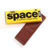 Partially unwrapped "Business Development Tool Custom Chocolate Bar" in yellow packaging reveals a block of chocolate.