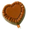 The Chunky Heart Lollipop features a heart-shaped chocolate design with a decorative border on a white stick.