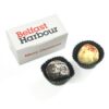Two chocolate truffles in black wrappers are placed next to a "Personalised Christmas 2 Chocolate Box" with the message "Belfast Harbour Merry Christmas.