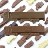 The Chocolate Truck is molded in the shape of a truck and various vehicles on a white surface.