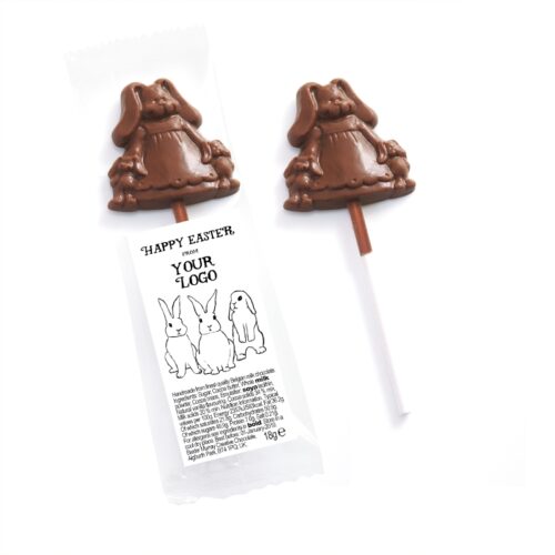 Two Yummy Mummy Bunny Lollipops, one wrapped and one unwrapped, displayed on a white background. The packaging features text and illustrations of rabbits.