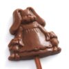 The Yummy Mummy Bunny Lollipop is a chocolate lollipop shaped like a rabbit in a dress. It features a smooth texture and detailed design.